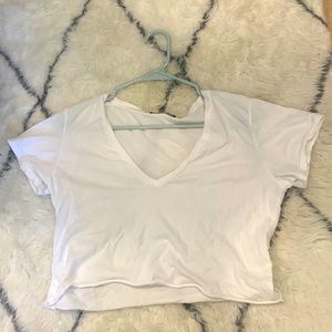 white v- neck cropped shirt